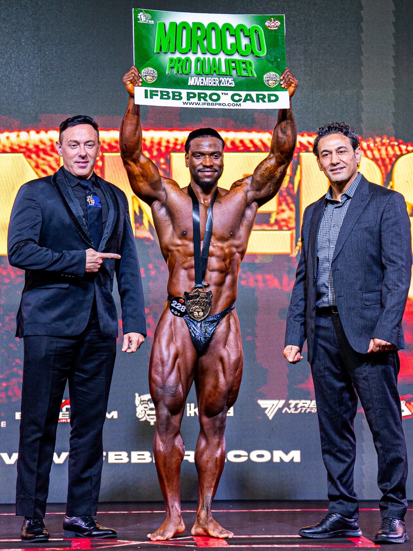 Pat celebrating with his IFBB Pro card